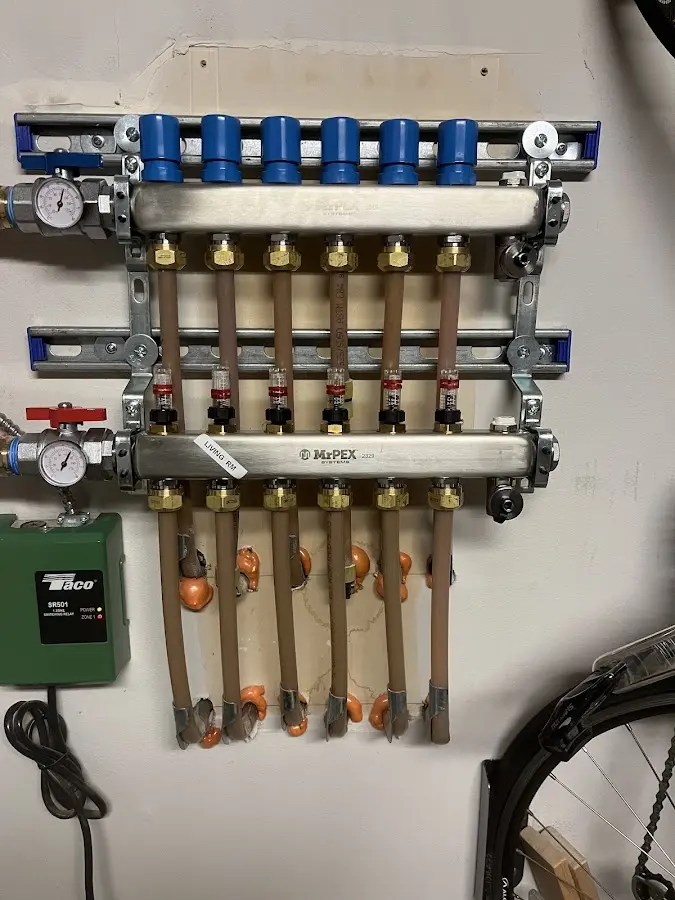 Plumber performing Gas Line Installation at a residential property in Lafayette